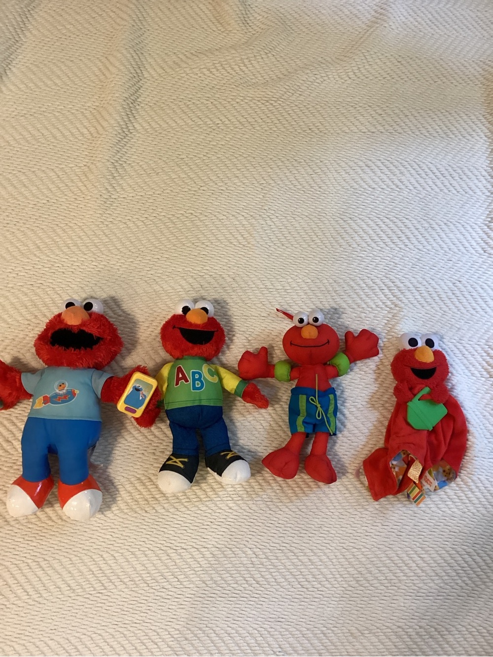 Sesame Street Vintage Red Elmo Plush Bundle Of FOUR with Colorful Outfits
